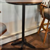 F46. Round high top table 42”h x 26”w 